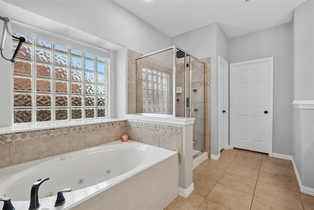8208 Rock Elm Rd, Fort Worth, TX 76131 - full bath with a shower stall, tile patterned floors, a jetted tub, and baseboards