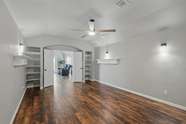 8208 Rock Elm Rd, Fort Worth, TX 76131 - unfurnished living room featuring wood finished floors, ceiling fan, built in shelves, baseboards, and lofted ceiling
