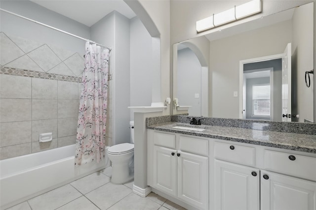 8208 Rock Elm Rd, Fort Worth, TX 76131 - full bathroom with tile patterned flooring, toilet, vanity, and shower / bath combo with shower curtain