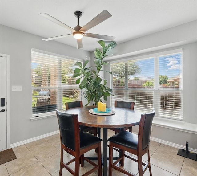 8208 Rock Elm Rd, Fort Worth, TX 76131 - dining room featuring ceiling fan, light tile patterned floors, and plenty of natural light