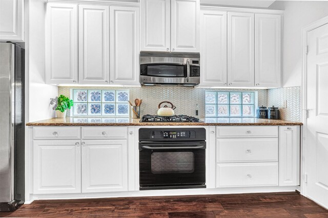 2283 Fox Crossing Ln, Frisco, TX 75036 - kitchen featuring white cabinetry and appliances with stainless steel finishes