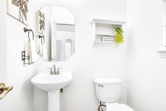 bathroom featuring toilet