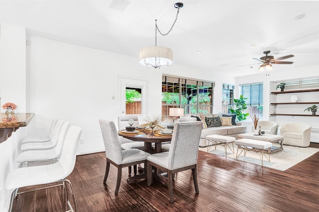 2283 Fox Crossing Ln, Frisco, TX 75036 - dining area with a ceiling fan, dark wood-style floors, and built in shelves