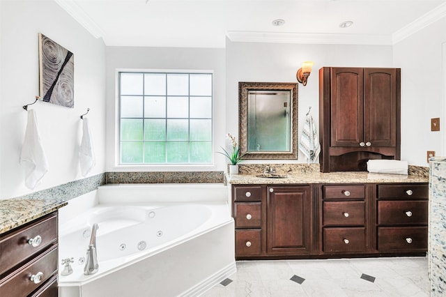 2283 Fox Crossing Ln, Frisco, TX 75036 - bathroom featuring a tub with jets, ornamental molding, and vanity