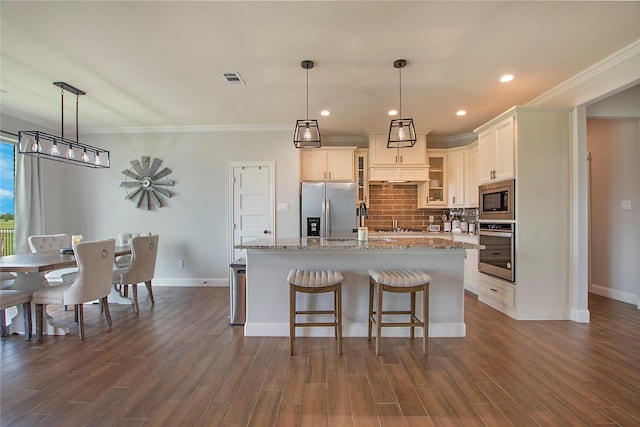 kitchen featuring baseboards, glass insert cabinets, backsplash, and stainless steel appliances