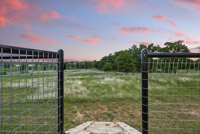 view of gate at dusk