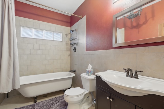 bathroom with vanity, bathtub / shower combination, toilet, and tile walls