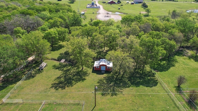 birds eye view of property with a rural view