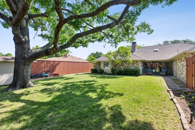 view of yard featuring fence