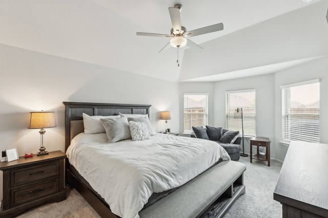 bedroom featuring high vaulted ceiling, light colored carpet, multiple windows, and ceiling fan