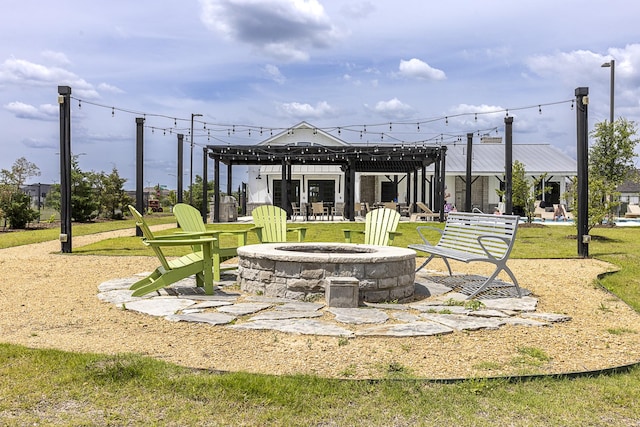 1424 Bellaire St, Celina, TX 75009 - view of community with an outdoor fire pit, a patio, and a yard