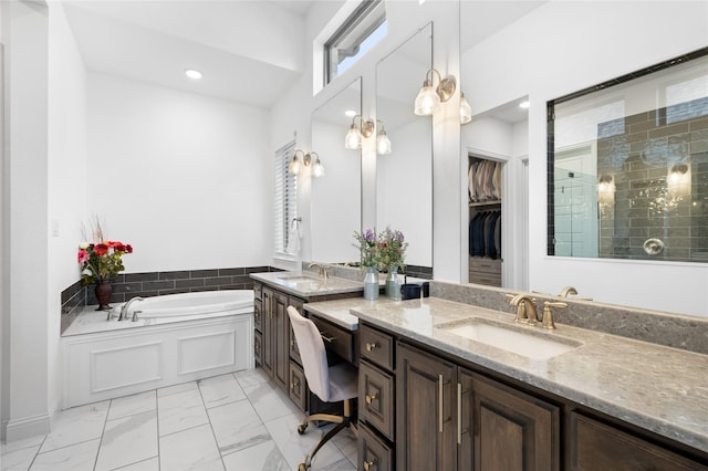 full bath featuring vanity, marble finish floor, recessed lighting, a bath, and a tile shower