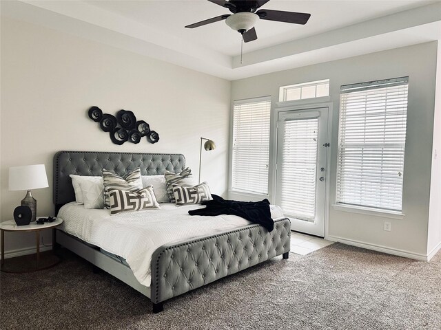bedroom featuring carpet floors, access to outside, baseboards, and a ceiling fan