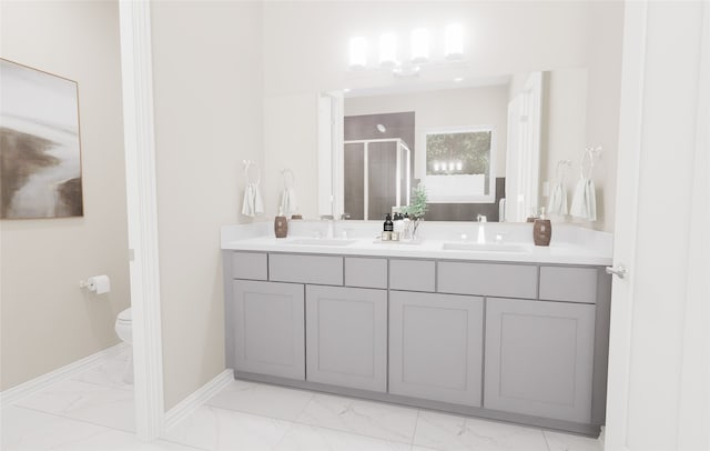 full bathroom with a sink, double vanity, toilet, marble finish floor, and a shower stall