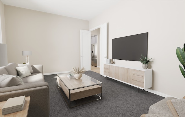 living room with baseboards and carpet