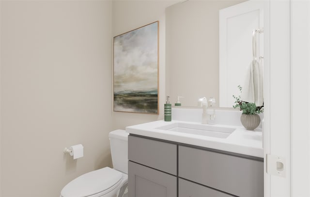 bathroom with vanity and toilet