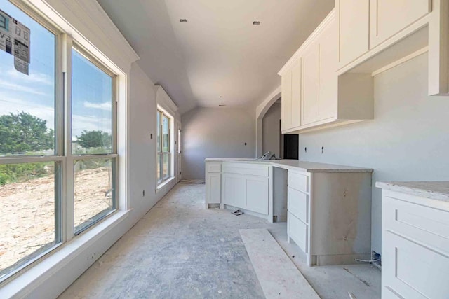 3406 Woodlake Dr, Granbury, TX 76048 - kitchen with white cabinetry and a sink