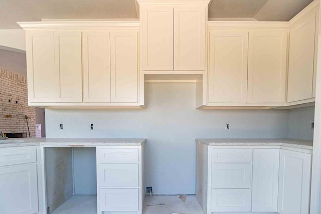 3406 Woodlake Dr, Granbury, TX 76048 - clothes washing area featuring a fireplace
