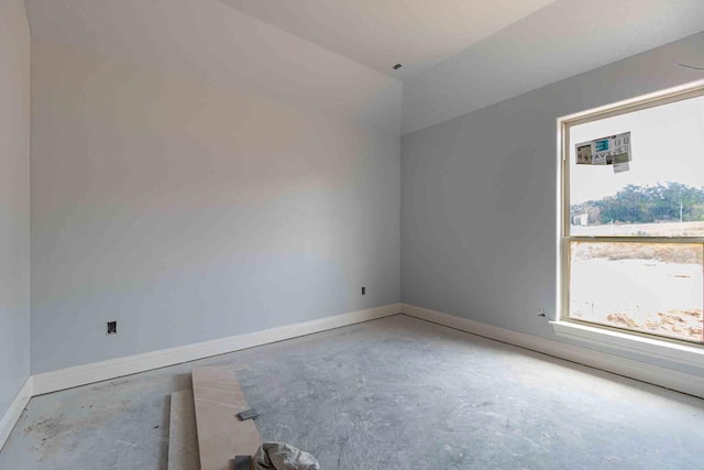 3406 Woodlake Dr, Granbury, TX 76048 - spare room featuring baseboards and unfinished concrete floors
