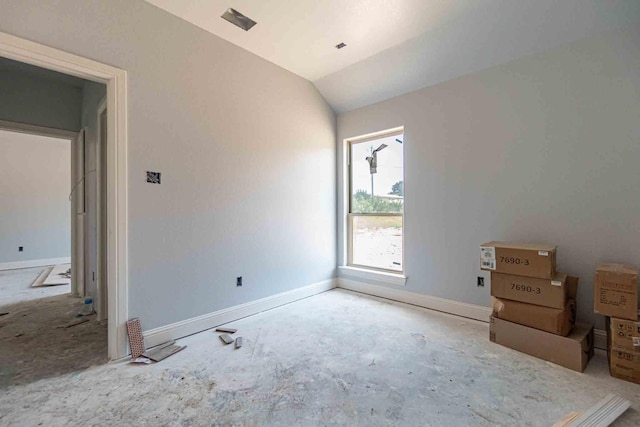3406 Woodlake Dr, Granbury, TX 76048 - unfurnished bedroom featuring baseboards and lofted ceiling