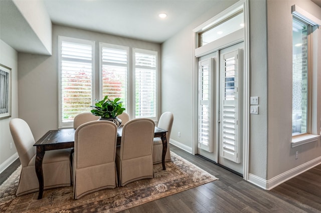 dining room with baseboards, recessed lighting, and dark wood finished floors