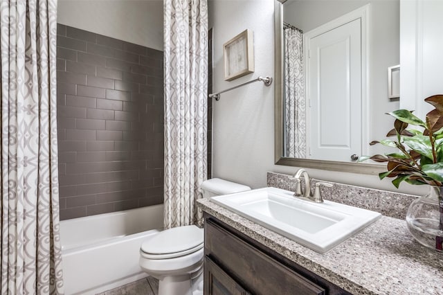 full bath with toilet, shower / tub combo, and vanity