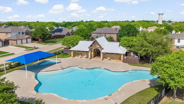 1711 Crescent Oak St, Wylie, TX 75098 - community pool with fence, a residential view, and a patio
