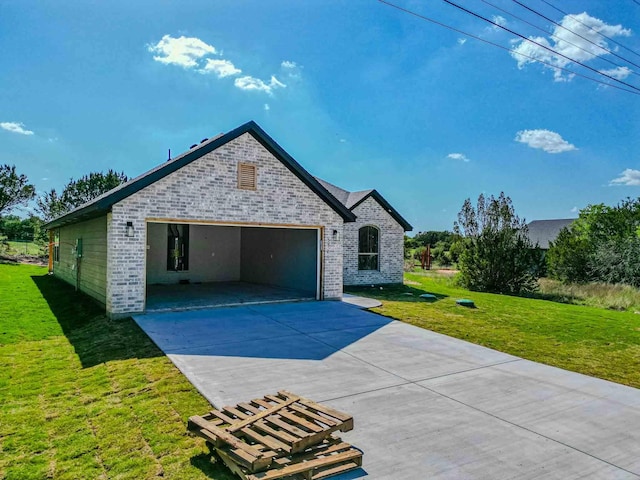 view of front of house featuring concrete driveway, brick siding, a garage, and a front lawn