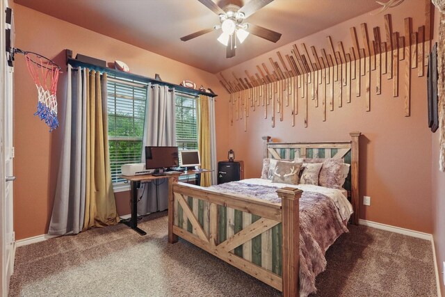 carpeted bedroom featuring baseboards, vaulted ceiling, and ceiling fan