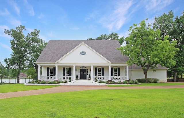 320 Hines Xing, Bullard, TX 75757 - neoclassical home with a porch, roof with shingles, fence, and a front yard