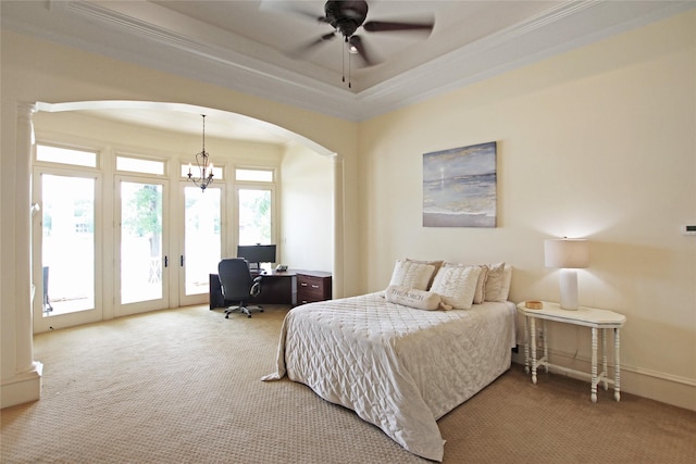 320 Hines Xing, Bullard, TX 75757 - carpeted bedroom featuring access to exterior, arched walkways, ceiling fan with notable chandelier, ornamental molding, and a tray ceiling