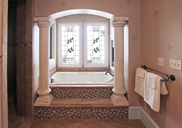 320 Hines Xing, Bullard, TX 75757 - bathroom featuring a tub with jets, decorative columns, and tile patterned flooring