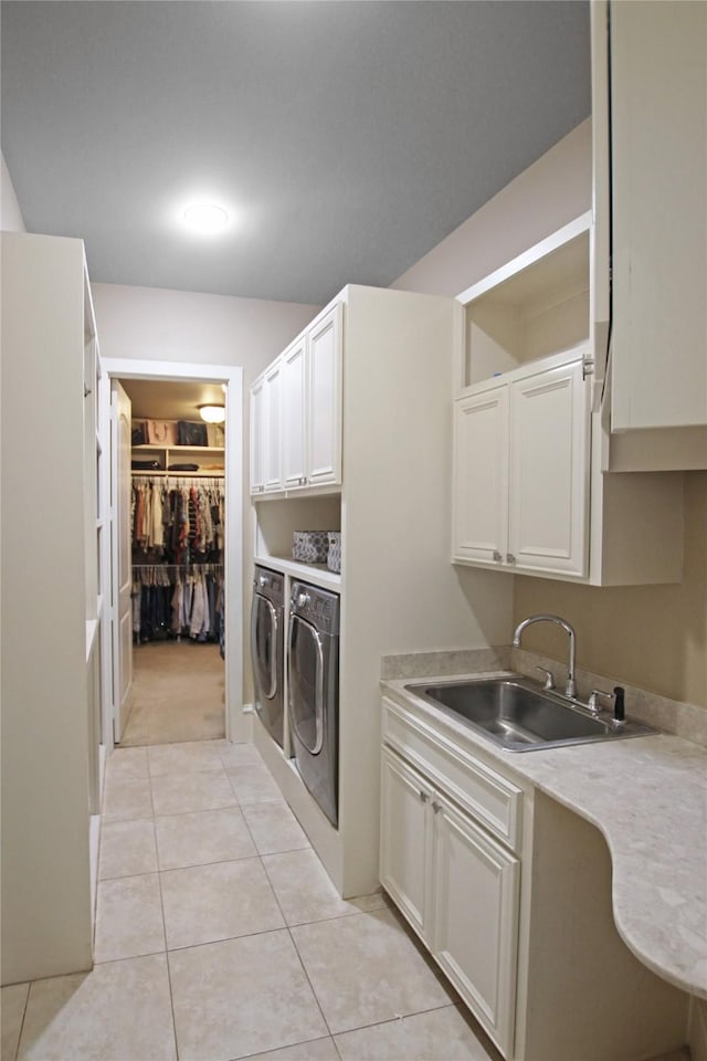 320 Hines Xing, Bullard, TX 75757 - laundry area with separate washer and dryer, a sink, cabinet space, and light tile patterned floors