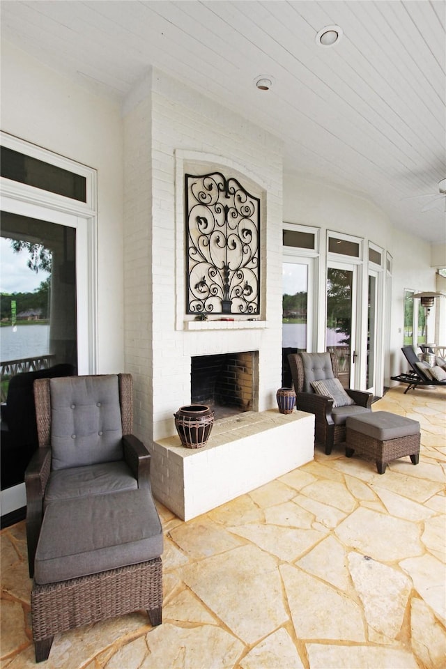 320 Hines Xing, Bullard, TX 75757 - view of patio / terrace featuring a brick fireplace