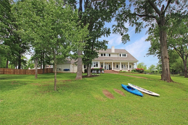 320 Hines Xing, Bullard, TX 75757 - back of house featuring a porch, fence, a yard, and a chimney