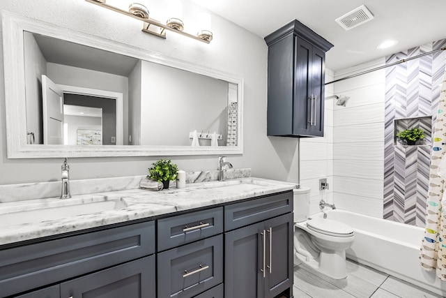 8911 Diceman Dr, Dallas, TX 75218 - full bathroom featuring visible vents, double vanity, shower / bath combo with shower curtain, toilet, and a sink