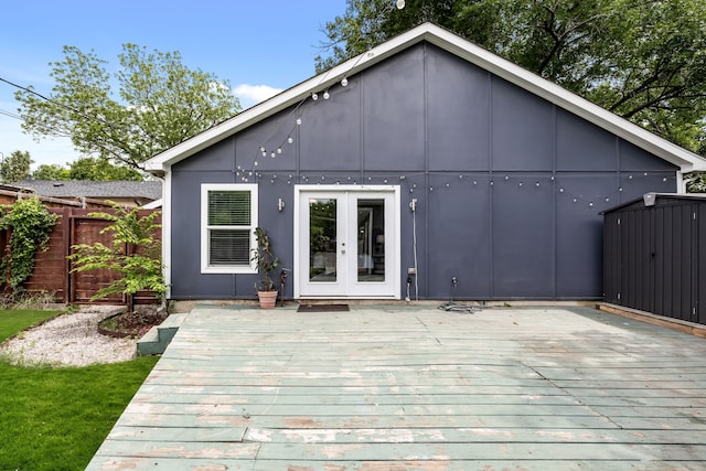 8911 Diceman Dr, Dallas, TX 75218 - back of property with fence, french doors, and a deck