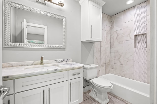 8911 Diceman Dr, Dallas, TX 75218 - full bath featuring toilet,  shower combination, recessed lighting, and vanity