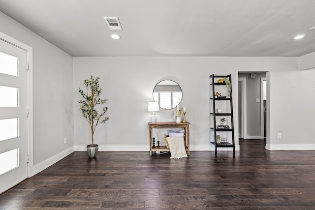 8911 Diceman Dr, Dallas, TX 75218 - foyer featuring recessed lighting, baseboards, visible vents, and wood finished floors