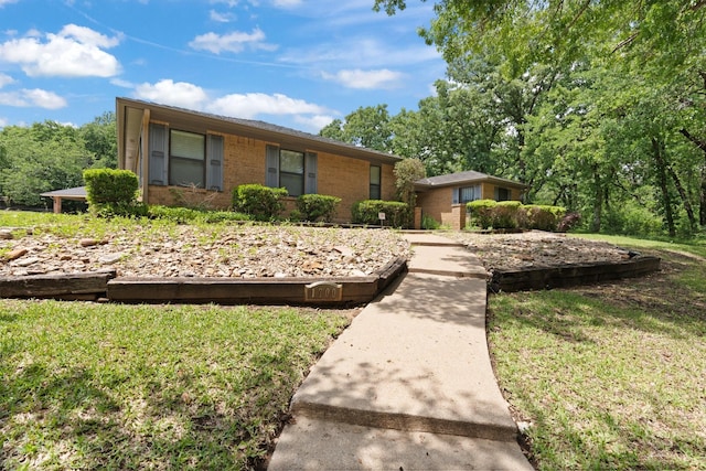 view of front of property featuring brick siding