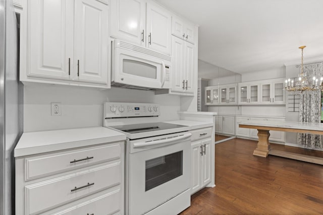 kitchen with light countertops, glass insert cabinets, white appliances, and white cabinetry