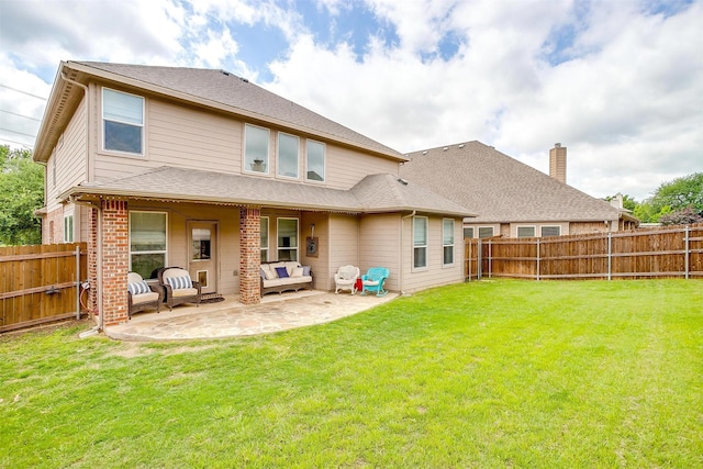 9820 Mullins Crossing Dr, Fort Worth, TX 76126 - back of house featuring a patio area, an outdoor hangout area, and a shingled roof