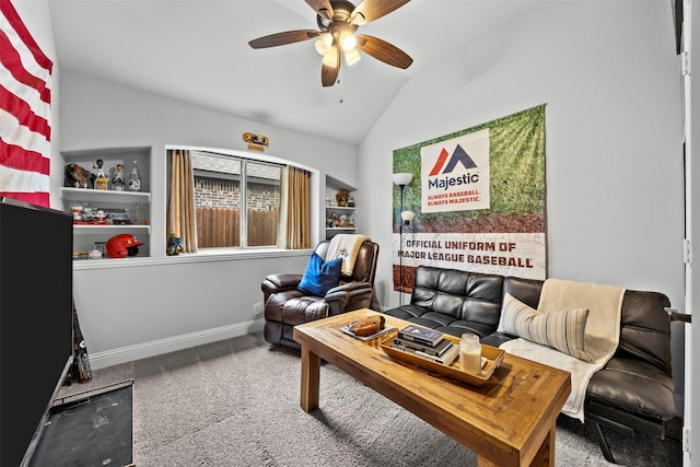 living area featuring vaulted ceiling, baseboards, ceiling fan, and carpet flooring