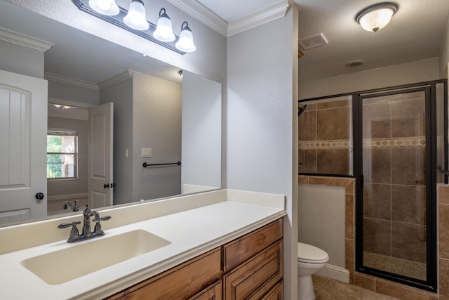 bathroom featuring crown molding, toilet, tile patterned floors, visible vents, and a stall shower