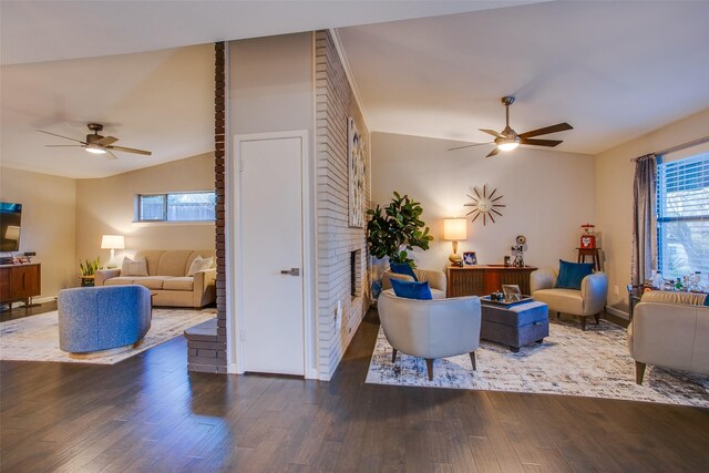 living area with plenty of natural light, ceiling fan, and wood finished floors