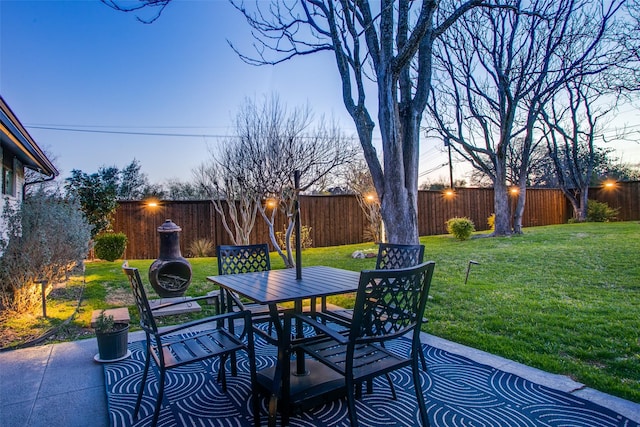 view of patio / terrace featuring outdoor dining area and a fenced backyard