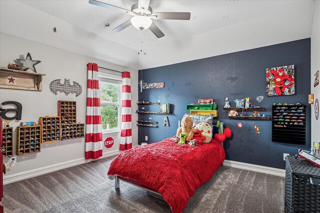 bedroom featuring baseboards, carpet flooring, and lofted ceiling