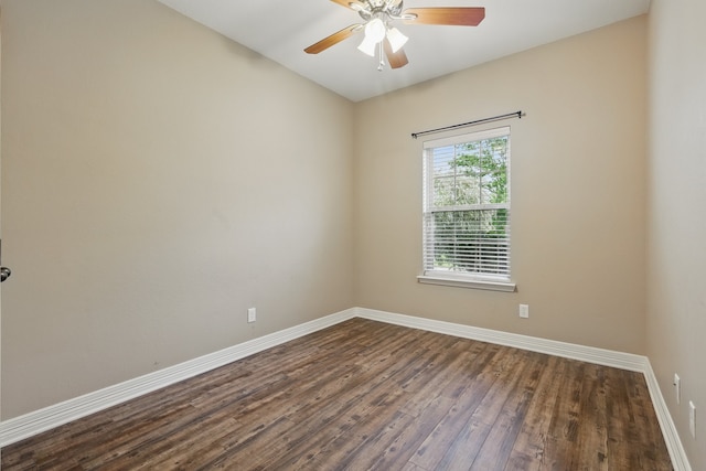 311 Wilson St, Whitesboro, TX 76273 - spare room with ceiling fan, baseboards, and dark wood-style floors