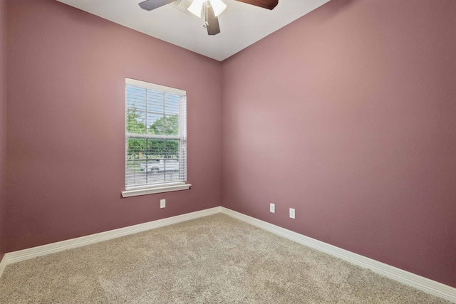 311 Wilson St, Whitesboro, TX 76273 - spare room with carpet floors, ceiling fan, and baseboards