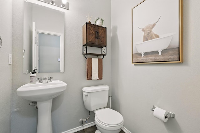 1612 Cambridge Dr, Providence Village, TX 76227 - bathroom with baseboards and toilet